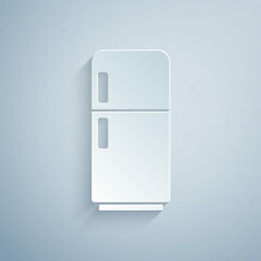 Paper cut Refrigerator icon isolated on grey background. Fridge freezer refrigerator. Household tech and appliances. Paper art style. Vector