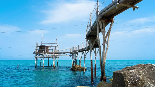 Trabocco Turchino in San Vito Chietino, Abruzzo. Trabucco a sort of Trebuchet, traditional fishing house on Costa dei Trabocchi (Coast Of the Trabocchi) UNESCO heritage 4K CINEMATIC CAMERA RAW FOOTAGE