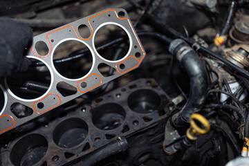 car engine repair, replacement of the cylinder head gasket.