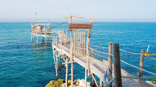 Trabocco Turchino in San Vito Chietino, Abruzzo. Trabucco a sort of Trebuchet, traditional fishing house on Costa dei Trabocchi (Coast Of the Trabocchi) UNESCO heritage 4K CINEMATIC CAMERA RAW FOOTAGE