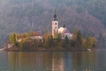 Lake Bled in the middle of the island with the church at sunset in the Triglav National Park,...