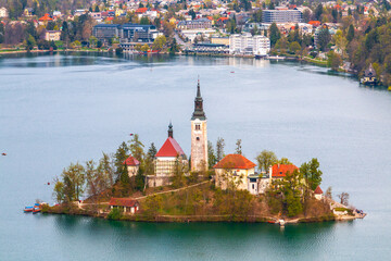 Lake Bled in the middle of the island with the church at sunset in the Triglav National Park,...