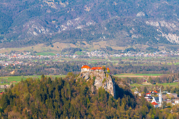 Lake Bled in the middle of the island with the church and the castle in the Triglav National Park...