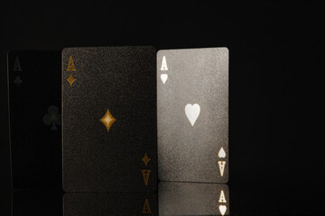 Aces of hearts and diamonds. Poker. Black background. Minimalism, strict lines. Sports poker, game...