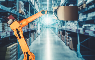 Smart robot arm system for innovative warehouse and factory digital technology . Automation manufacturing robot controlled by industry engineering using IOT software connected to internet network .