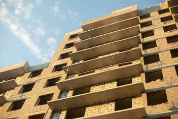 Building a house. Multi-storey building without cladding.