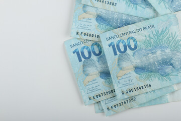 Brazilian money. 100 reais banknotes. Copy space