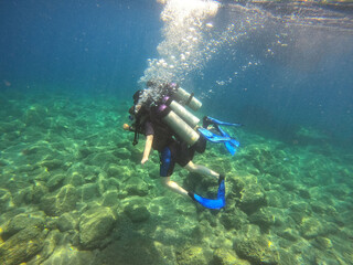 Tourists scuba dive Mediterranian Sea. Marmaris,Turkey.