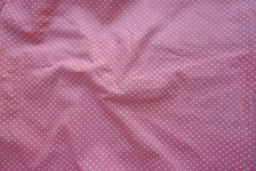 Fototapeta na wymiar wrinkled polka dot fabric in english lavender color