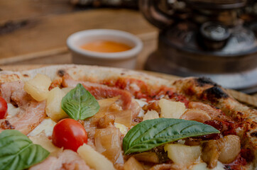 Pizza with cherry tomatoes and cheese, closeup