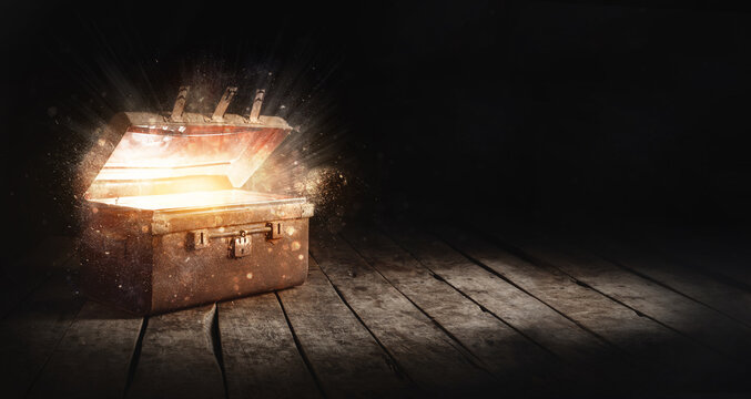 Open the glowing ancient treasure chest.
