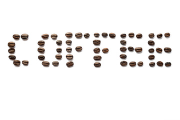 Coffee word title written with coffee beans isolated on white background