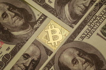 Cryptocurrency sign and symbol under a pile of dollar banknote. Idea for blockchain, the new type...