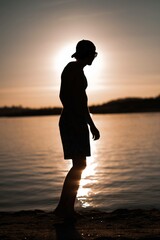 Fototapeta premium silhouette of a person on the beach