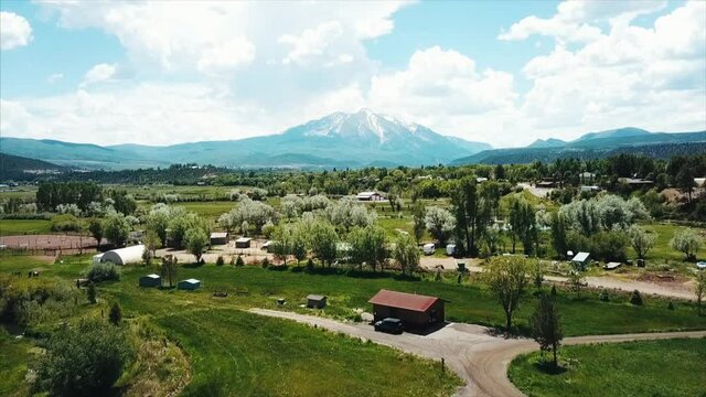 Aerial over a quaint mountain town, Carbondale Colorado. 