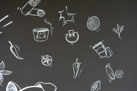 chalk printing of vegetable, fruit and seafood sketch on chalkboard