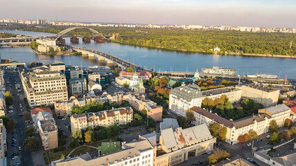 Obraz premium Aerial top view of Kyiv cityscape, Dnieper river and Podol historical district skyline from above, city of Kiev, Ukraine 