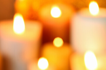 Golden abstract background with candles.