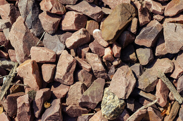 Crimson Quartzite. Chipped rubble stone. Random pieces of red st