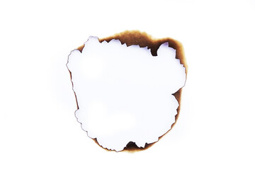 Burned hole on a white paper background
