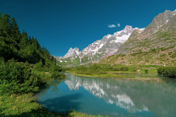 Fototapeta premium Summer trekking day in the mountains of Val Veny, Courmayeur