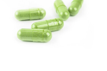 andrographis herb capsule on white copy space, andrographolide herbal capsule, paniculata pill capsule herb