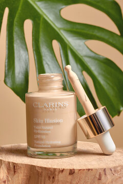 Udachny, Russia - August 28, 2021:
Makeup foundation 
Clarins. Famous cosmetics in glass bottle.
Famous French luxury product brand Clarins perfumes,skincare and cosmetics.