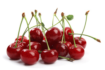 Pile of fresh ripe cherries on white background