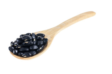 Black Eyed Peas in wooden spoon on white background.