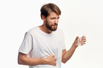 handsome man drinking water isolated background