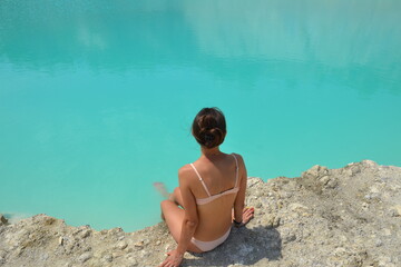 woman sitting on the beach