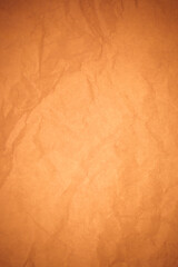 Crumpled brown paper background.