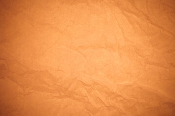Fototapeta premium Crumpled brown paper background.