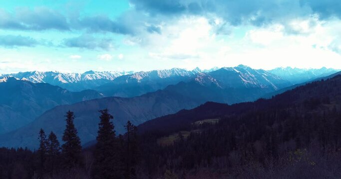 aerial drone shot of Himalayan mountain range in the morning.