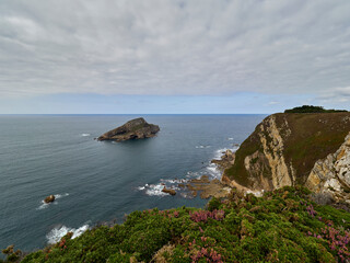 Deva Island, in Asturias, Spain, seen from the coastal cliffs.