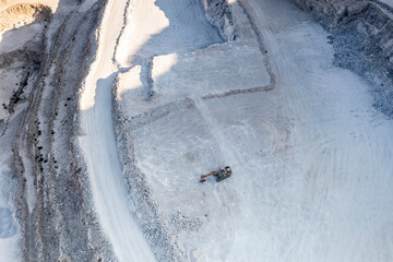 panoramic view of the white mountains with mining and equipment filmed from a drone 