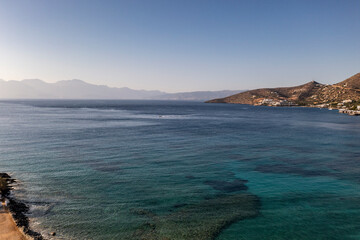 panoramic view of the Greek landscape with mountains and sea of Crete island filmed from a drone 