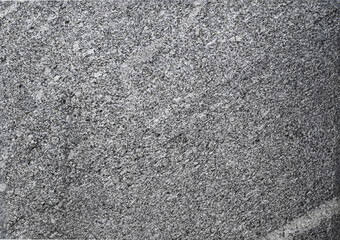 Abstract background. Fragment of a wall of marble close-up.