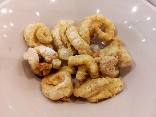 Pork snack, Pork scratching or pork crackling in a bowl , Thai food