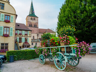 Street with colorful traditional french houses in Turckheim, France
