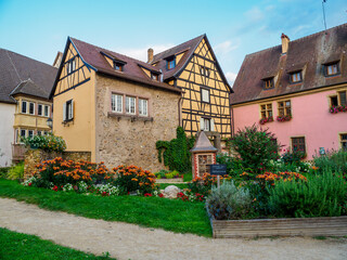 Fototapeta na wymiar Street with colorful traditional french houses in Turckheim, France