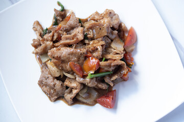 Stir-fried pork with black pepper close-up
