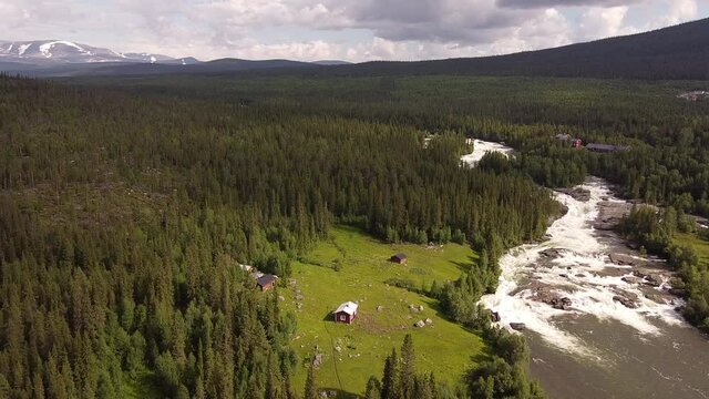 Summer in the forest and mountains around Kvikkjokk near STF Mountain Station, drone footage, Lapland, Sweden