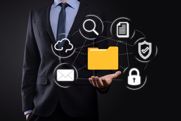 Document Management System DMS .Businessman hold folder and document icon.Software for archiving,...