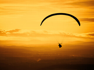 Paragliding on the beautiful sunset