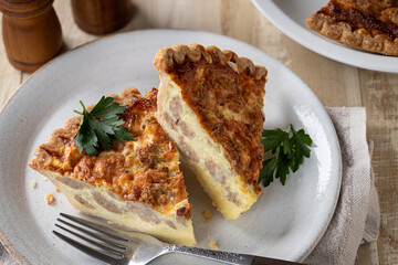 Two slices of sausage quiche