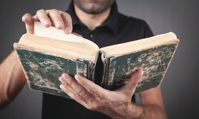Caucasian man reading bible. Religion