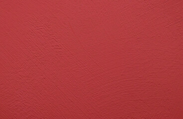 Red paint streaks on concrete wall backdrop. Artistic.