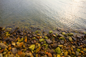 Fototapeta na wymiar pattern of coastal rocks Relaxation concept and calm water