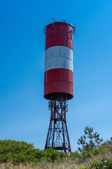 Lighthouse on the Baltic Sea coast. Curonian Spit, the village of Lesnoy.